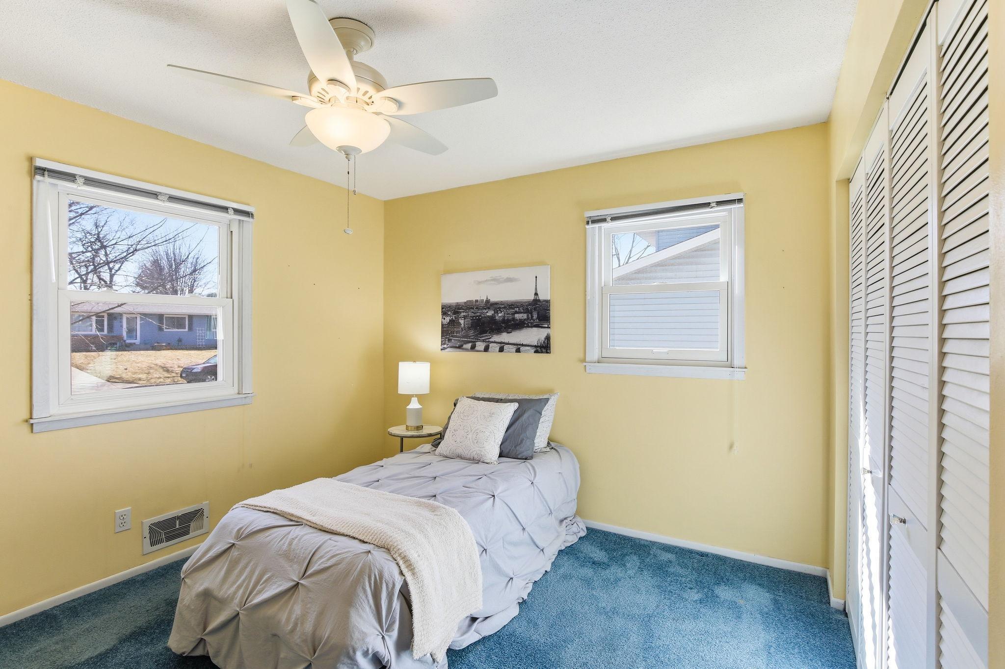 This Bedroom also has Hardwood Floors Underneath the Carpet.