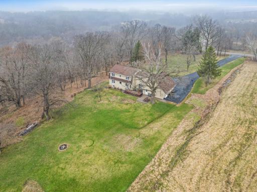 A rare blend of open space, wooded ground, and privacy