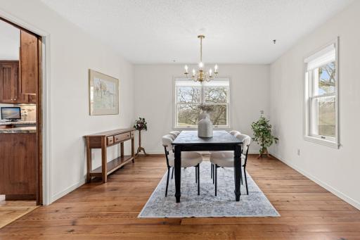 Bright dining room ready for everyday meals or special occasions