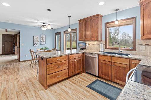 Gorgeous kitchen with abundant cabinetry and counter space