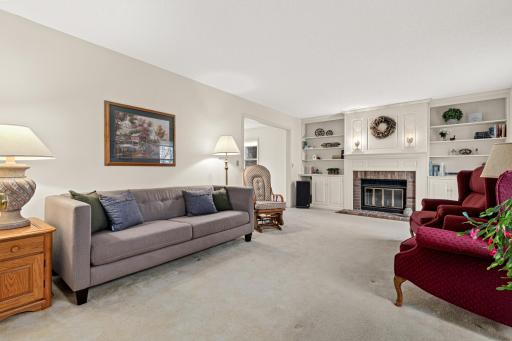 Comfortable living room with built-ins and a fireplace for everyday gathering