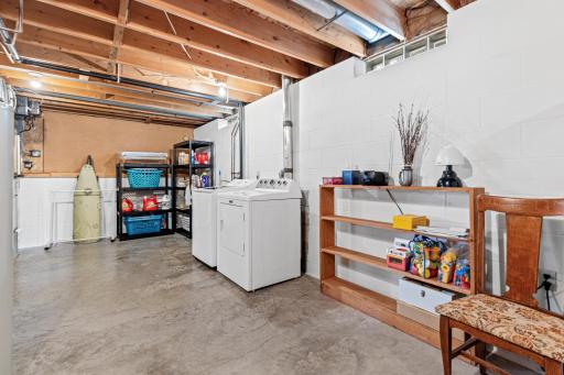 Lower level includes laundry area and plenty of functional space