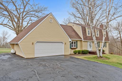 Spacious two-story home with oversized garage and a true country feel