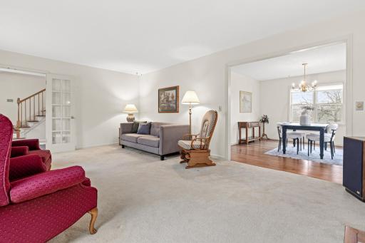 Spacious living room opens to the formal dining room for easy flow