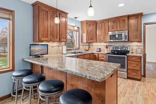 Large Breakfast Bar offers extra prep space and casual seating