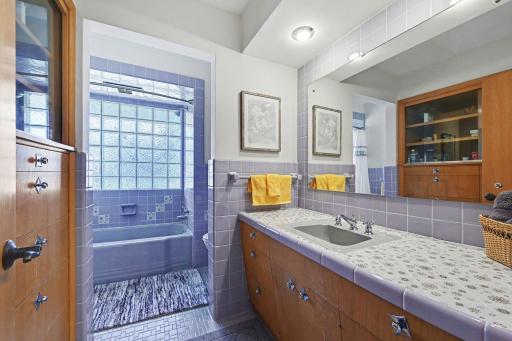 Main floor full bath full of mid century charm!