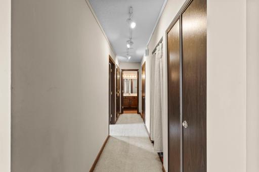 The hallway comes with two oversized hall closets with extensive storage and a dedicated linen closet that will make organization quick and easy