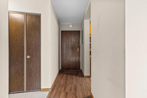 Functional coat closet adjacent to the entryway for easy organization
