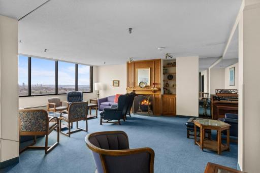 Gather and unwind in the resident lounge, featuring a welcoming fireplace and remarkable views