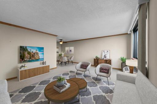 Spacious living area that opens to the dining area and provides lots of natural light