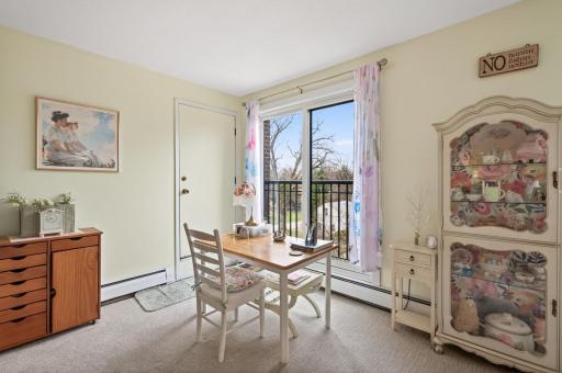 Plenty of space to have home office towards back of living room. Single door leads to screen porch
