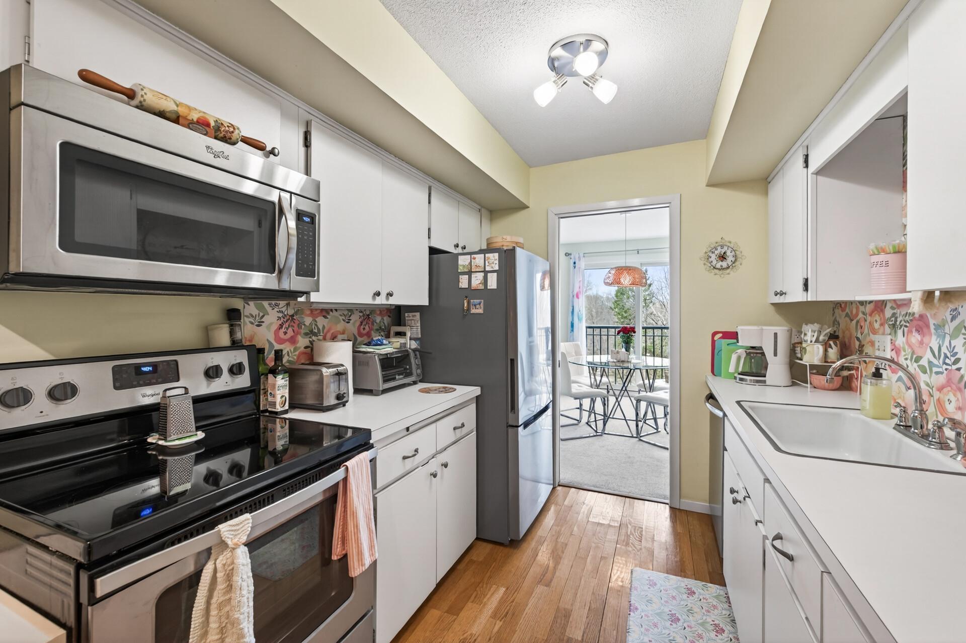 Stainless appliance and hardwood floor