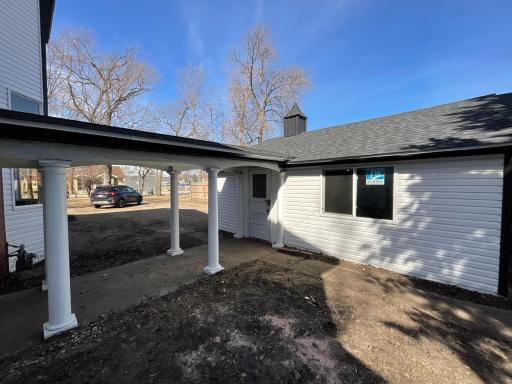Breezeway walk through from garage into the home, Brand new roof, siding and brand new window in garage.
