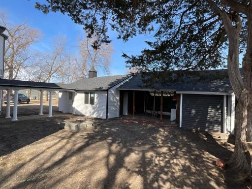 Lots of backyard space for campfires ( side of garage with area for storage and xtra room for doing your projects