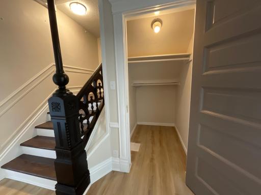 Convenient closet place next to your original antique crafted staircase