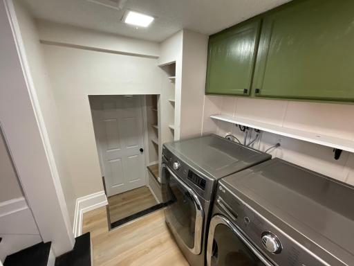 Laundry room looking down where basement is located