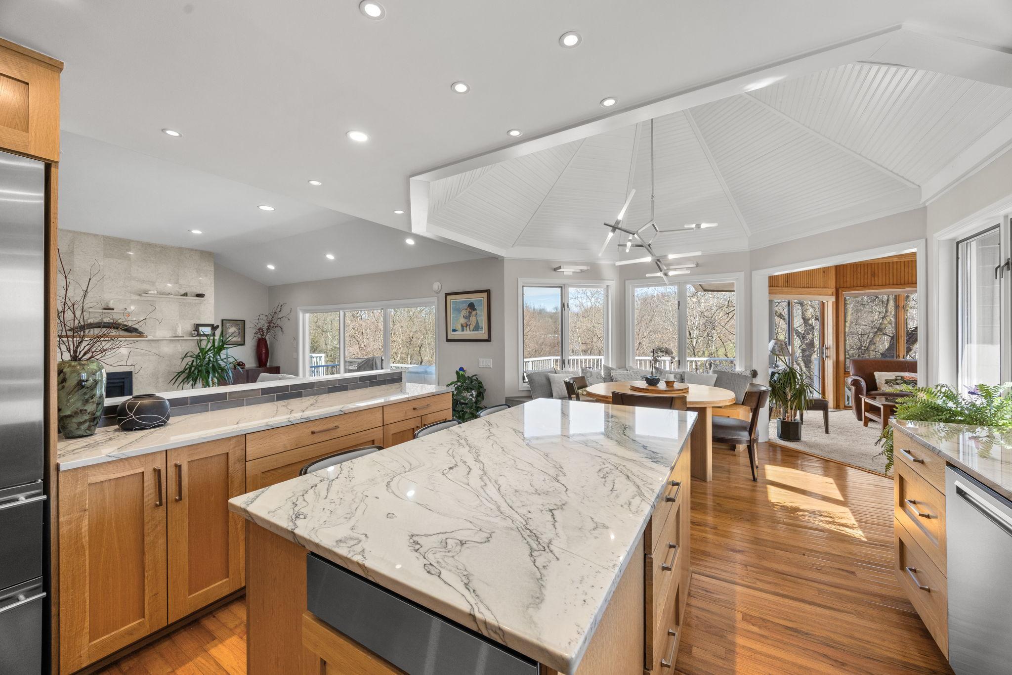 Beyond the kitchen is the informal dining area.