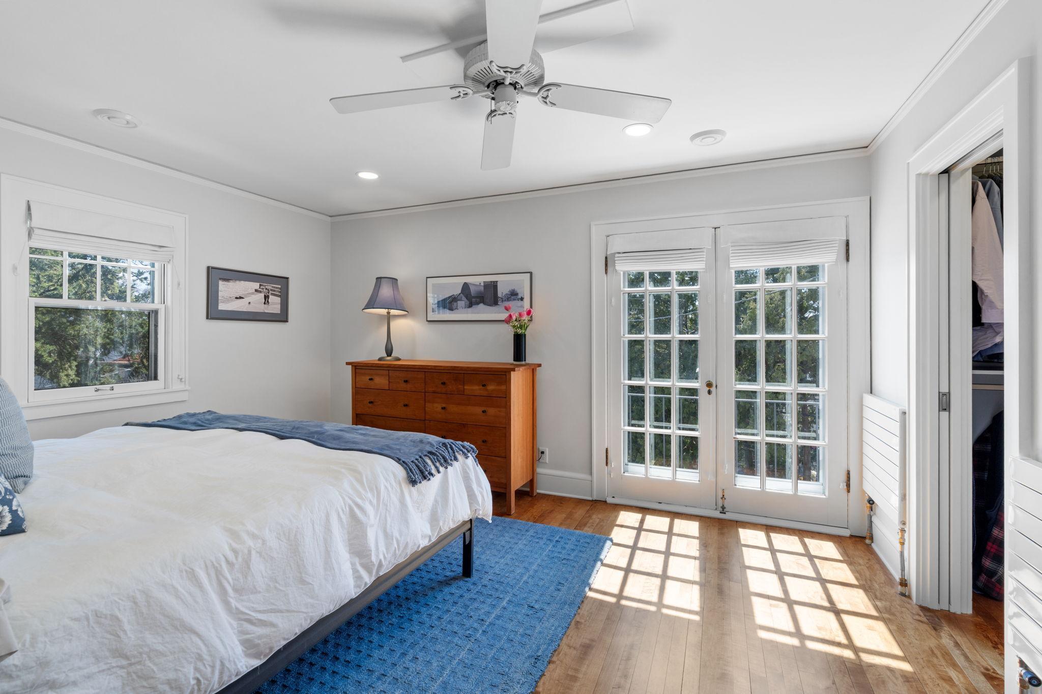 Primary has private access to a small balcony