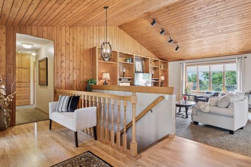 Vaulted ceiling, custom built-ins and tons of windows!