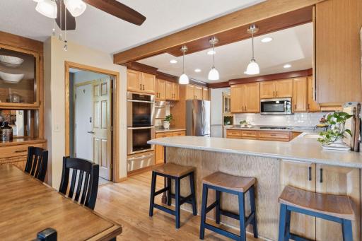 Stainless appliances including double wall oven.