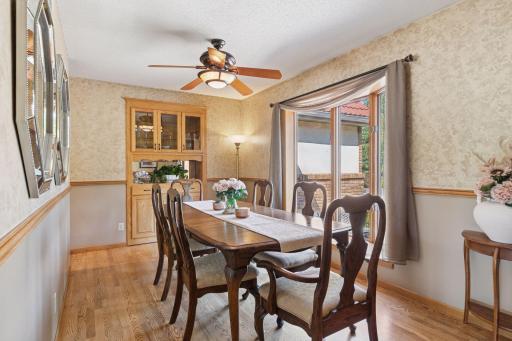 Formal dining room views patio out front.
