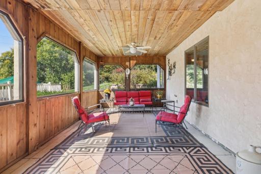 Lower level walk-out sun room.