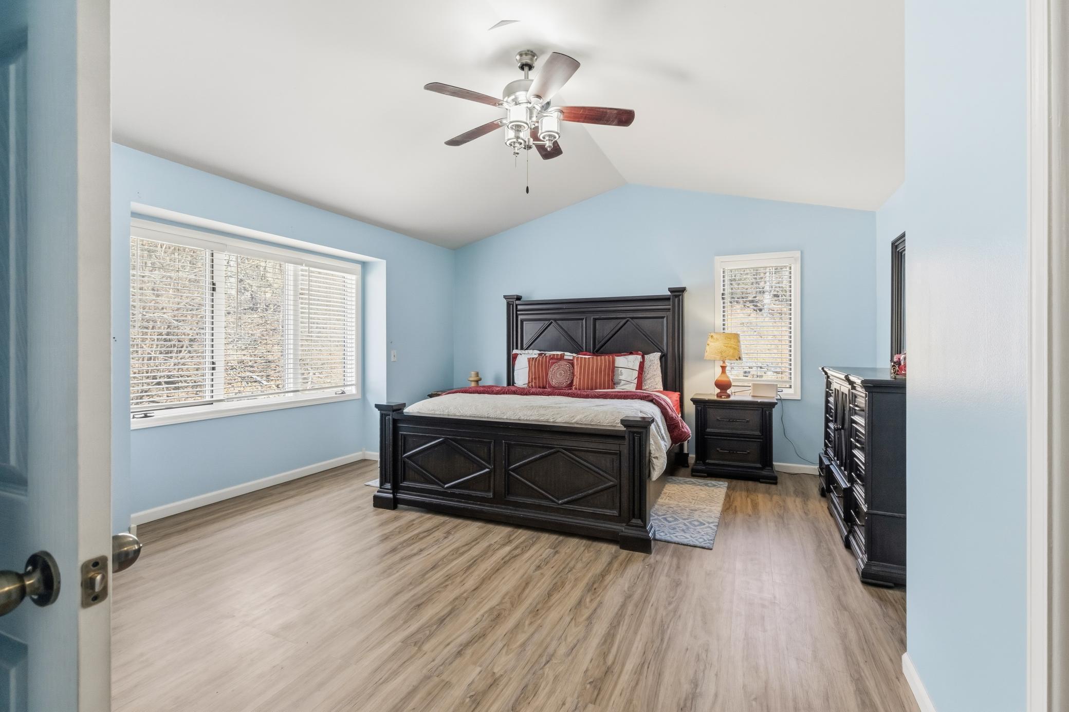 Welcome to your primary suite - huge, bright, with an updated private bathroom ensuite and walk in closet!