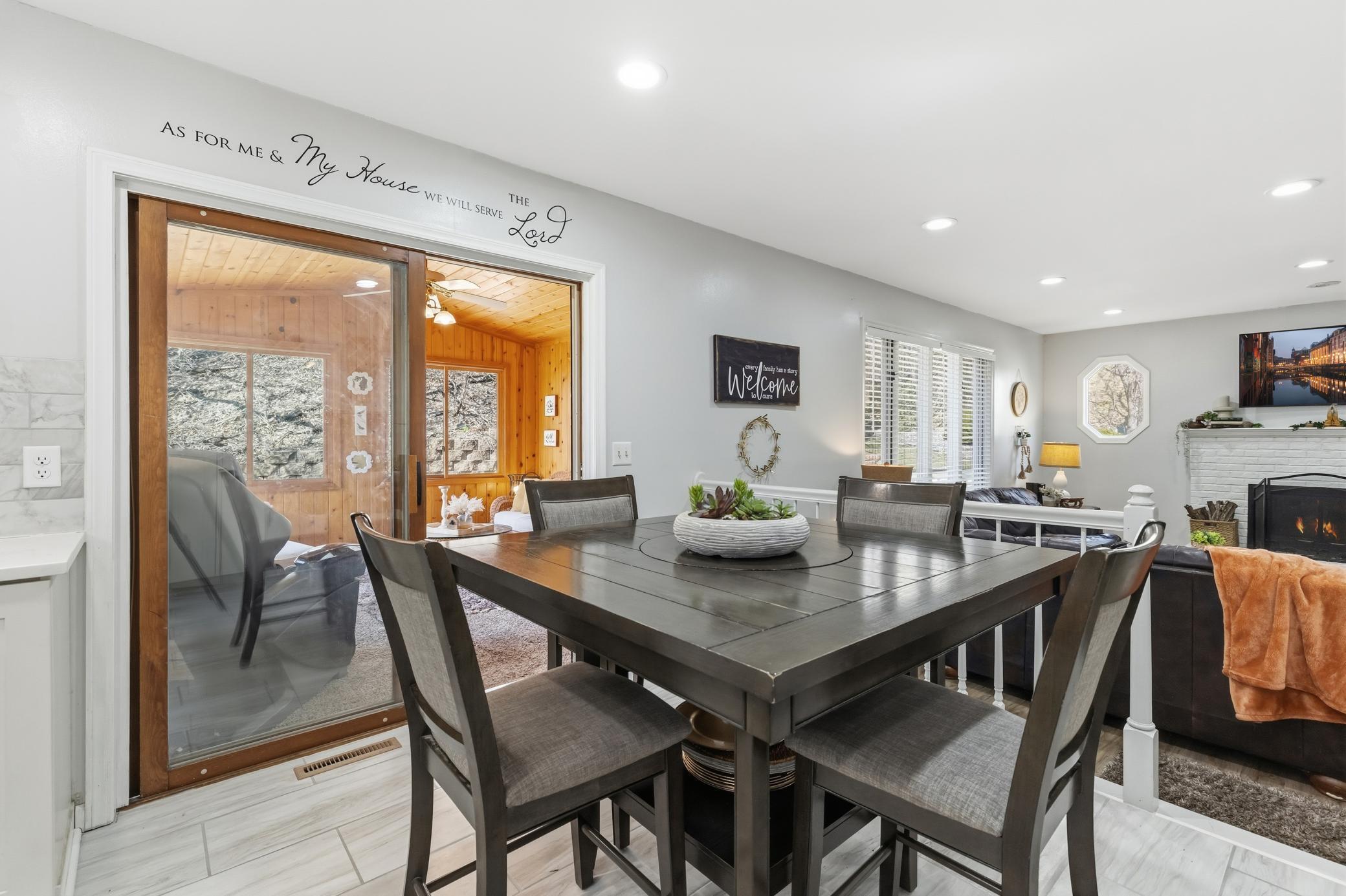 Informal dining gives you a 3rd option! Imagine the entertaining you can do or hosting holidays!! (Check out the beautiful 3 season porch behind you!)