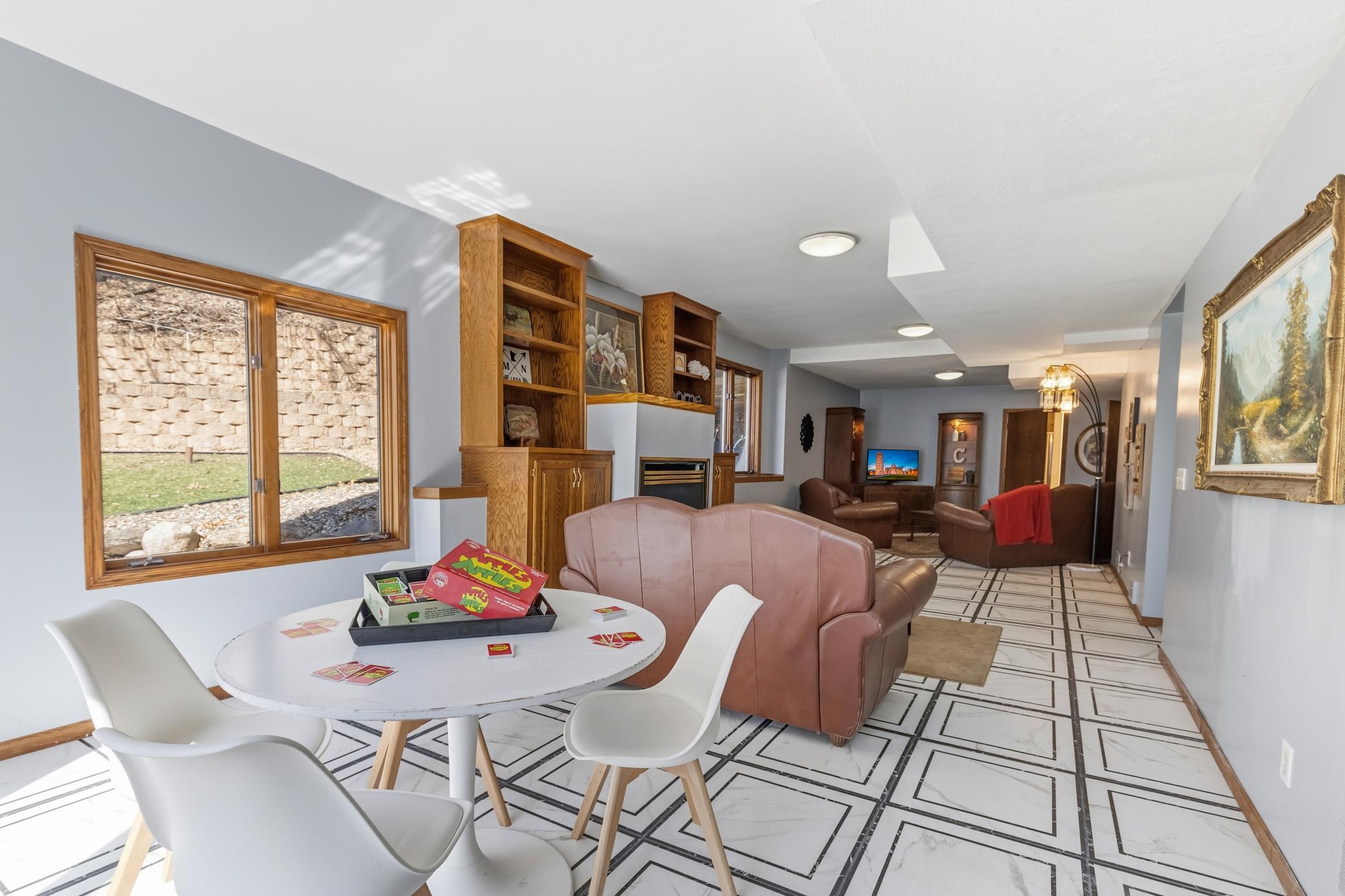 This homes walk-out lower level is SO generously sized that you can have multiple living/working 'zones'! Family room, sitting area, game area or a great homeschooling area - the options are limitless..