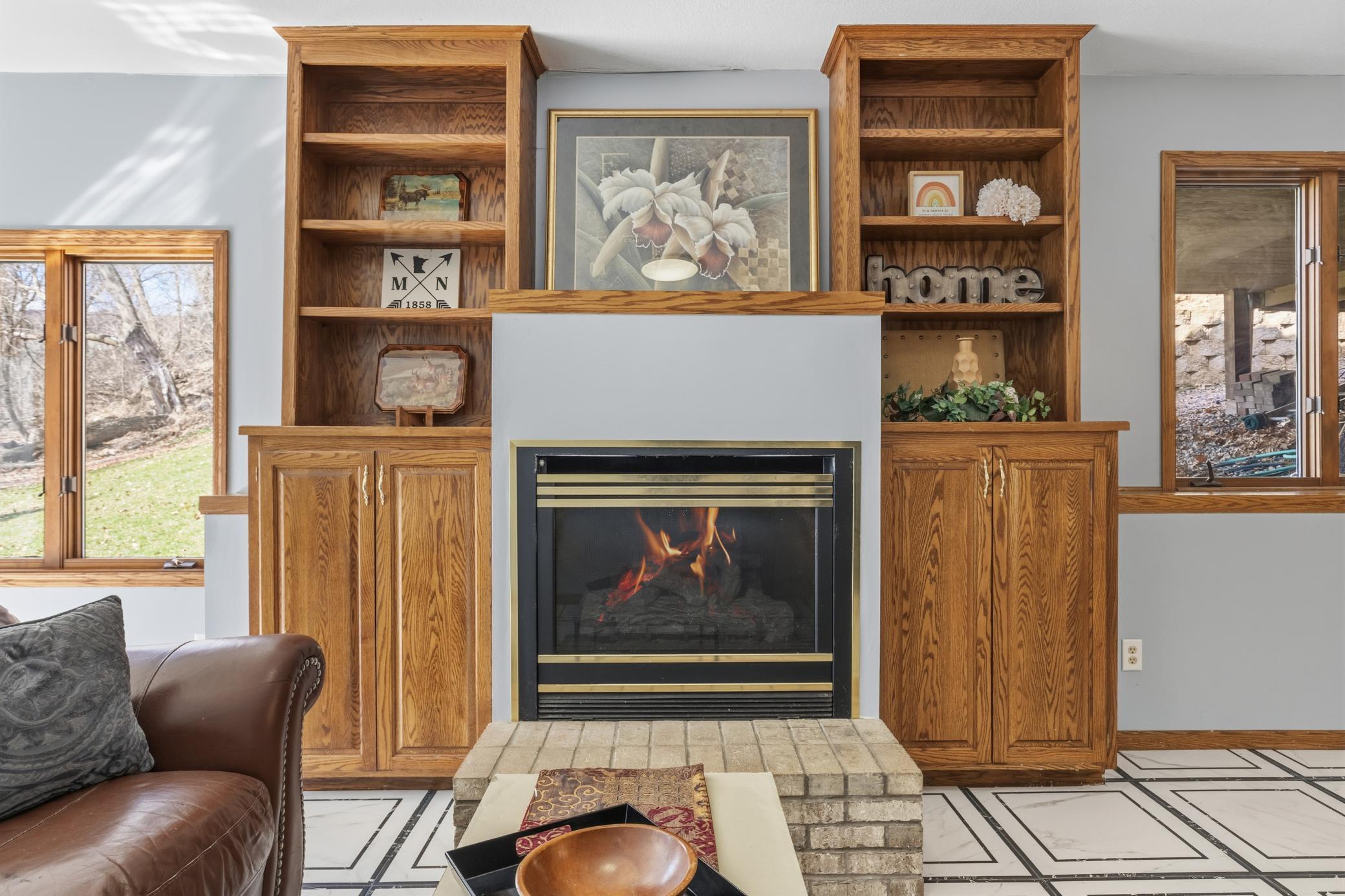 Fireplace #2 in the lower level give you both warmth & ambience....