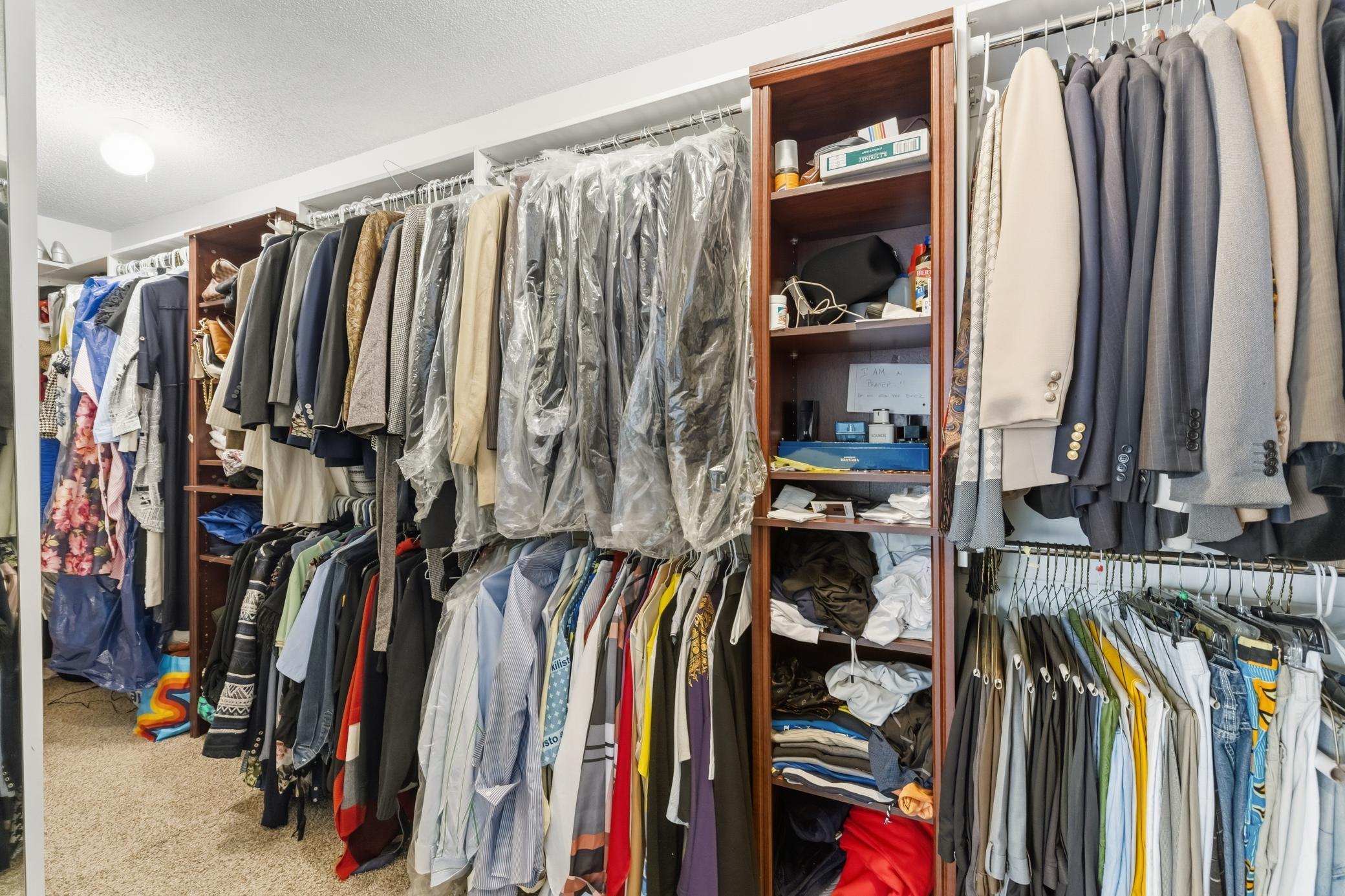 Primary closet is 12 feet long and you have to see it to appreciate it!