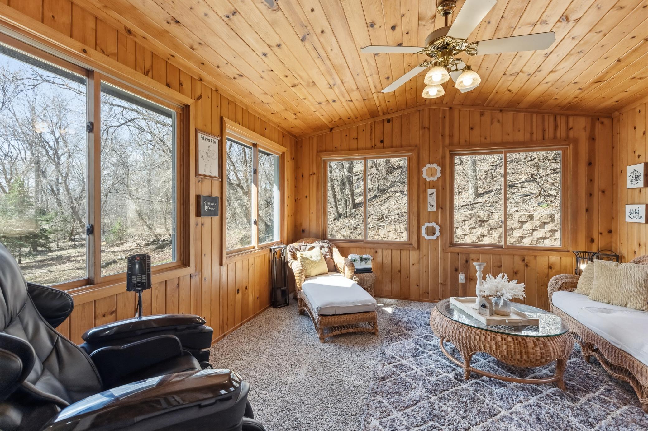 This is the GEM of the home.... perfect for anytime of year, you can cozy up with a good book, bird watch with all the mature trees you're surrounded with and more.