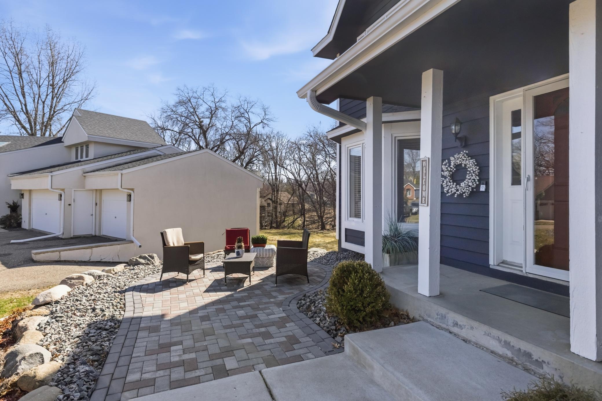 Inviting custom paver patio greets you as you enter this beauty....