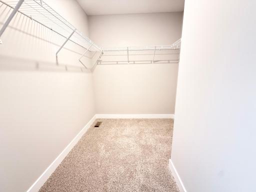 This primary suite has two large walk-in closets