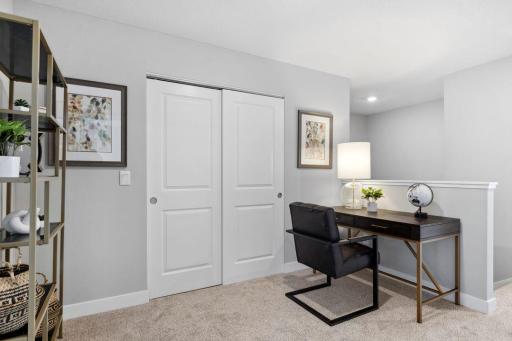 Loft on the second floor of the home, perfect for remote working! Photo is of model home. Colors and options may vary. Ask Sales Agent for details.