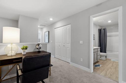 2nd floor loft right off secondary bedrooms and bathroom. Photo is of model home. Colors and options may vary. Ask Sales Agent for details.