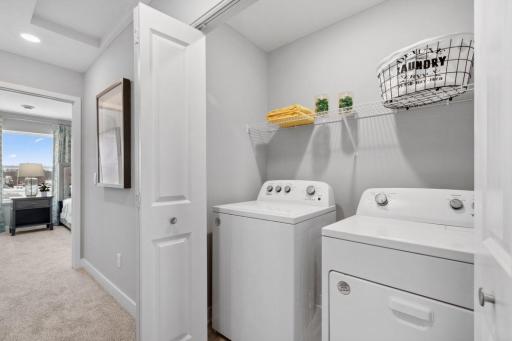 Upper-level laundry makes this task so much easier! Photo is of model home. Colors and options may vary. Ask Sales Agent for details.