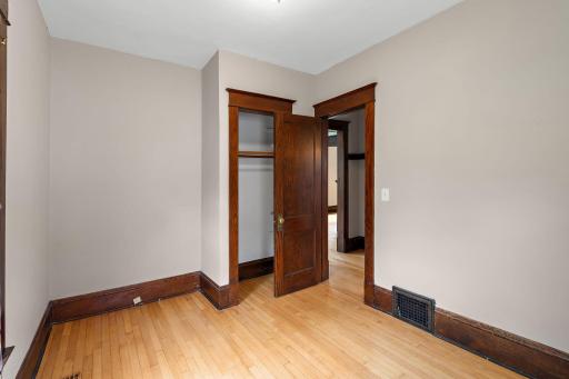The 2nd main floor bedroom overlooks the front yard.