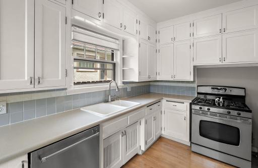 Ample counter space & stainless steel appliances are a great feature of this kitchen.
