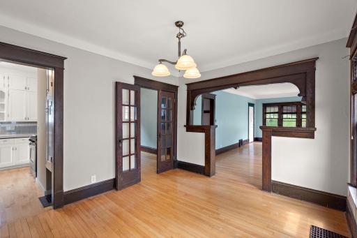 Off the dining room you will find one of the two main floor bedrooms. This room has French doors. and could make a wonderful home office or media room.