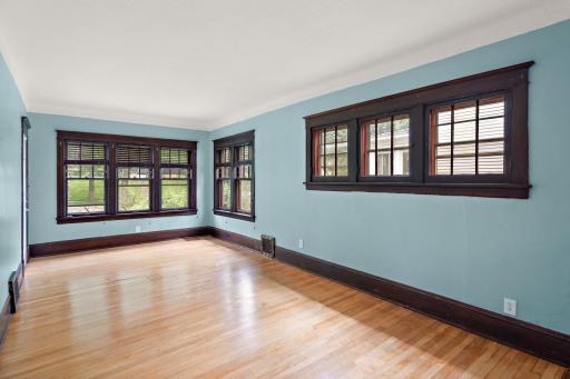 Coved ceilings, ornate woodwork round out the Living Room.