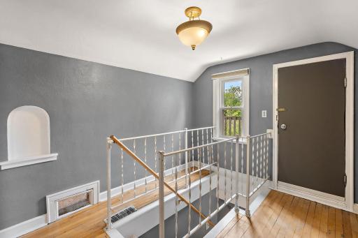 The landing on the second floor would be an amazing area for bookcases.