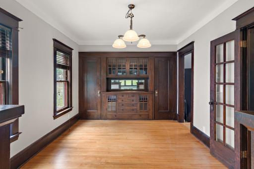 The large formal dining room has impressive storage for a home built in 1911.