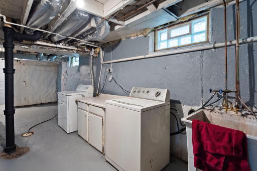Washer, dryer & laundry sink.