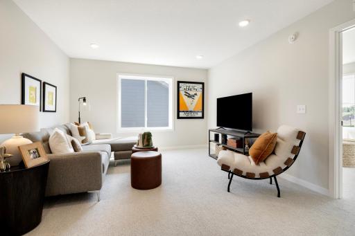 This spacious upstairs loft/bonus room offers endless possibilities for customization. he open design allows for versatile use to suit your lifestyle. Photos are from previously built home; options & features may vary.