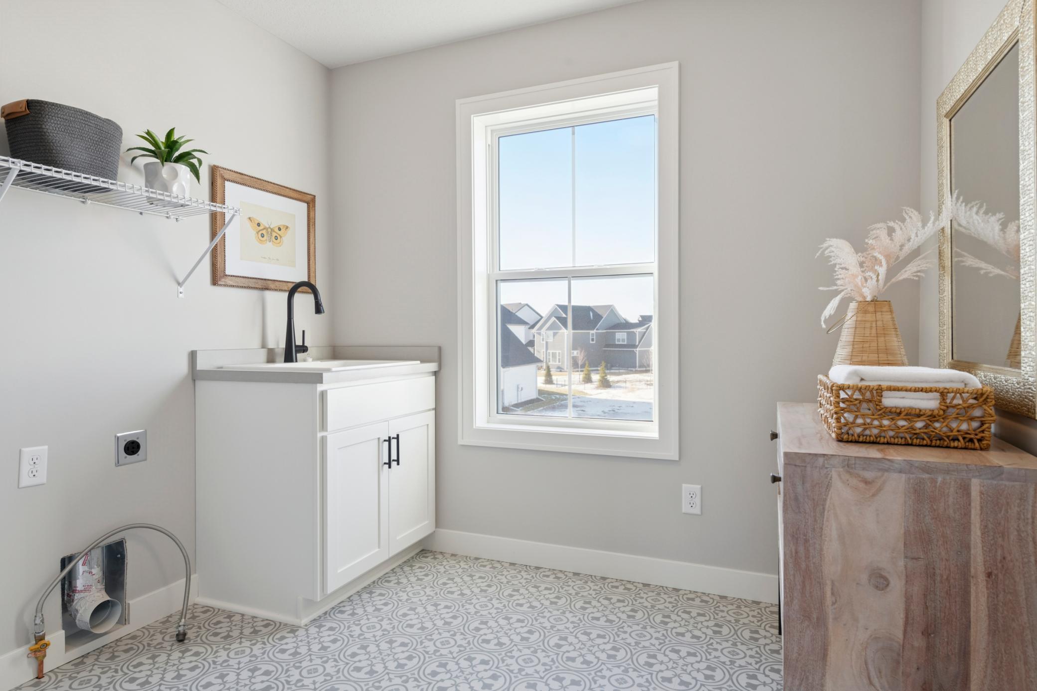Laundry Room *Photos are of like home and may not depict actual home plan. Configurations, features, materials and finishes may contain options that are not included in the price.
