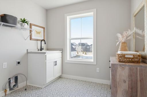 Laundry Room *Photos are of like home and may not depict actual home plan. Configurations, features, materials and finishes may contain options that are not included in the price.