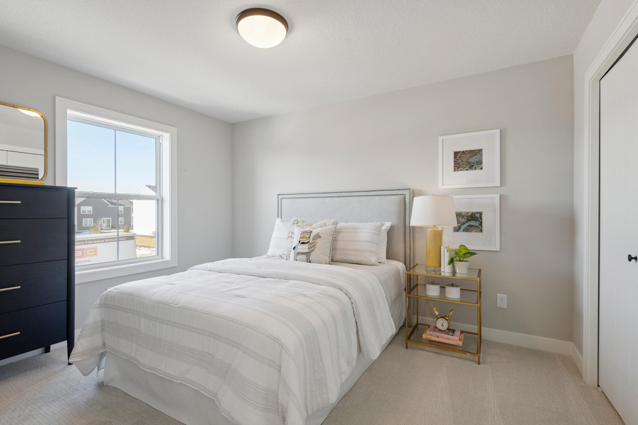 Upper Bedroom *Photos are of like home and may not depict actual home plan. Configurations, features, materials and finishes may contain options that are not included in the price.