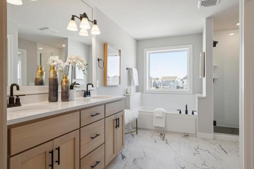 Owner's Bathroom *Photos are of like home and may not depict actual home plan. Configurations, features, materials and finishes may contain options that are not included in the price.