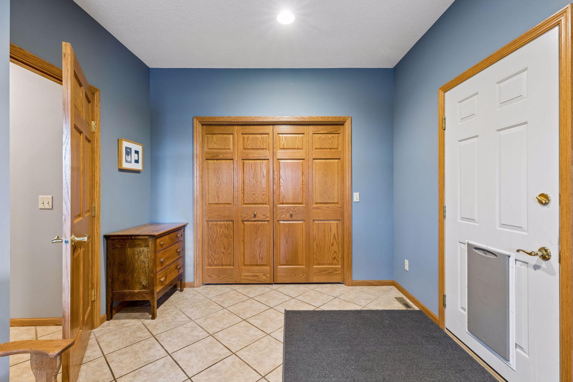Huge mudroom located off the attached garage with a closet